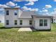The home features a well-maintained backyard with a concrete patio, perfect for outdoor entertainment and relaxation at 4903 Greenloch Ct, Monroe, NC 28110