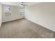 Simple bedroom with neutral walls and carpeted floors at 4903 Greenloch Ct, Monroe, NC 28110