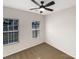 Bright bedroom with neutral walls, carpet, and two windows at 4903 Greenloch Ct, Monroe, NC 28110