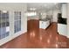 Open concept kitchen with island and hardwood floors at 4903 Greenloch Ct, Monroe, NC 28110