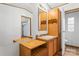 Bathroom features a vanity with storage and a toilet at 499 Indian Hill Rd, Olin, NC 28660