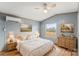 Main bedroom with a window and wooden dresser at 499 Indian Hill Rd, Olin, NC 28660