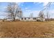 Mobile home exterior with shed at 499 Indian Hill Rd, Olin, NC 28660