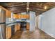 Kitchen with wood cabinets, stainless steel appliances, and tile floor at 499 Indian Hill Rd, Olin, NC 28660