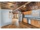 Kitchen with wood cabinets and stainless steel appliances at 499 Indian Hill Rd, Olin, NC 28660