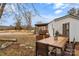 Rustic wooden patio table with chairs at 499 Indian Hill Rd, Olin, NC 28660