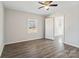 Bedroom featuring gray laminate flooring, a window, and neutral paint at 505 Kings Mountain St, Clover, SC 29710