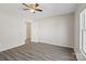 This bedroom offers wood-look floors, neutral walls, and a closet with ample storage at 505 Kings Mountain St, Clover, SC 29710