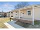 Charming home featuring a covered front porch with columns and brick accents at 505 Kings Mountain St, Clover, SC 29710