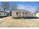 Charming home featuring a covered front porch with columns and brick accents at 505 Kings Mountain St, Clover, SC 29710