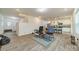 Open living room and kitchen with gray vinyl plank flooring at 518 Switch St, York, SC 29745