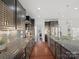 Modern kitchen with dark brown cabinets and granite countertops at 523 Rock Skip Way, Fort Mill, SC 29708