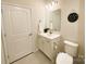 Bright bathroom with a single sink vanity and a decorative wall hanging at 577 Rustlewood Way, Rock Hill, SC 29732