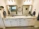 Bathroom featuring dual sinks, granite countertops, and stylish fixtures at 577 Rustlewood Way, Rock Hill, SC 29732