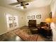 Comfortable living room featuring hardwood floors, a ceiling fan, and classic decor at 577 Rustlewood Way, Rock Hill, SC 29732