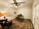 Bright home office featuring wood floors, ceiling fan, and plenty of natural light perfect for working at home at 577 Rustlewood Way, Rock Hill, SC 29732