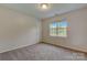 Bright bedroom with neutral walls, carpet flooring, and ample natural light at 5813 Bridgeway Dr, Indian Trail, NC 28079