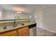 Kitchen with granite countertops and stainless steel sink at 5813 Bridgeway Dr, Indian Trail, NC 28079