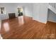 Bright living room featuring hardwood floors and fireplace at 609 Mountainwater Dr, Charlotte, NC 28262