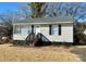 Updated bungalow with new siding, steps and landscaping at 624 Windy Hill Dr, Gastonia, NC 28052