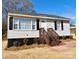 Newly renovated ranch home with a charming front porch at 624 Windy Hill Dr, Gastonia, NC 28052