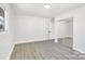 Spacious bedroom featuring mirrored closet doors at 6309 Spring Garden Ln, Charlotte, NC 28213