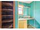 Small bathroom with sink and wooden shelving at 643 Alf Hoover Rd, Lincolnton, NC 28092