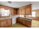 View of kitchen, showing wood cabinets and sink at 643 Alf Hoover Rd, Lincolnton, NC 28092