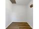 Small room with light grey walls and wood-look flooring at 7015 Cardigan Ave, Charlotte, NC 28215