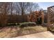 Small backyard with wooden fence and sparse landscaping at 7912 Charter Oak Ln, Charlotte, NC 28226