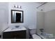 Bathroom with a single vanity and bathtub at 7912 Charter Oak Ln, Charlotte, NC 28226