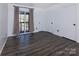 Bedroom with sliding glass door to balcony at 7912 Charter Oak Ln, Charlotte, NC 28226