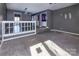 Open living room with split level and view into the kitchen and dining areas at 7912 Charter Oak Ln, Charlotte, NC 28226