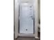 Clean shower with glass enclosure and built-in shelves at 7912 Charter Oak Ln, Charlotte, NC 28226