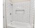 Clean bathroom with white subway tiles, bathtub, and shower at 815 3Rd St, Kings Mountain, NC 28086