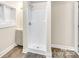 Bathroom featuring a shower stall and grey vinyl flooring at 815 3Rd St, Kings Mountain, NC 28086