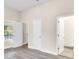 Bedroom with wood-look floors, door to bathroom, and window at 815 3Rd St, Kings Mountain, NC 28086