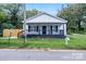 Charming white house with a front porch and well-maintained lawn at 815 3Rd St, Kings Mountain, NC 28086