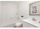 Clean bathroom with a tub shower, toilet, sink, and neutral color scheme at 821 Greentree Dr, Charlotte, NC 28211