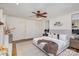 Bright main bedroom boasting a modern bed, neutral decor, and hardwood floors at 821 Greentree Dr, Charlotte, NC 28211