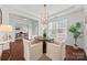 Bright dining room featuring four chairs, modern light fixture, and view to the office at 8312 Compton Acres Ln, Waxhaw, NC 28173