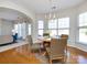 Dining room with natural light, a round table, and seating for four at 9613 Long Hill Dr, Charlotte, NC 28214