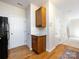 A bright kitchen with white subway tiles, wooden cabinets, granite countertops at 9613 Long Hill Dr, Charlotte, NC 28214