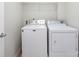 Laundry room features a washer and dryer at 9613 Long Hill Dr, Charlotte, NC 28214