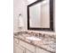 Bathroom featuring granite countertops, modern fixtures, and a decorative mirror at 102 W Vista View Pl, Mooresville, NC 28117