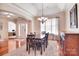 Well-lit dining room with a large table, chandelier, and wood floors at 102 W Vista View Pl, Mooresville, NC 28117