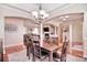 Dining room area featuring wood floors, chandelier, and arched doorways at 102 W Vista View Pl, Mooresville, NC 28117