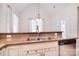 Kitchen sink and countertops featuring stainless steel appliances and custom cabinetry at 102 W Vista View Pl, Mooresville, NC 28117