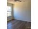 Bright bedroom with large window and ceiling fan at 1027 Adams St, Statesville, NC 28677