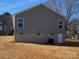 Gray house with two windows and a back door at 1027 Adams St, Statesville, NC 28677